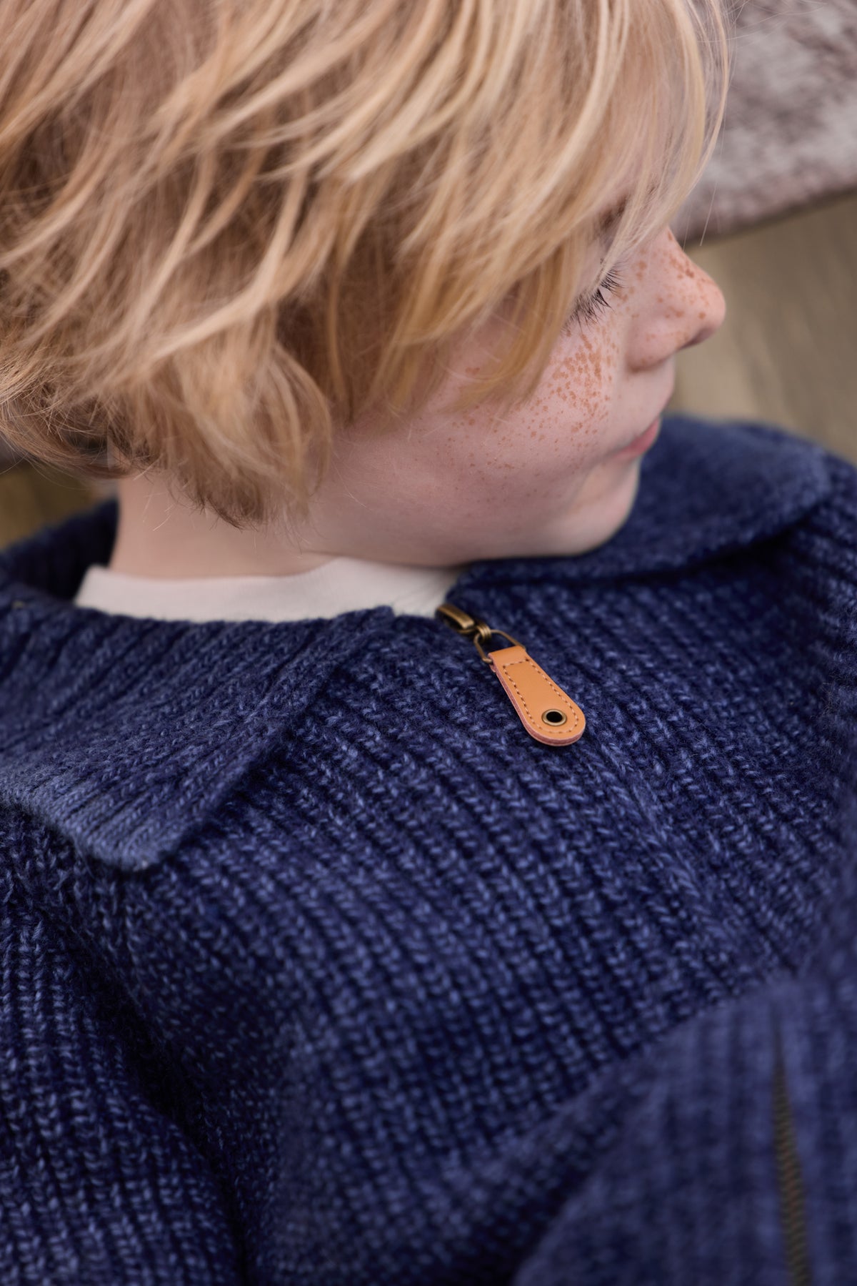 Cardigan - Pimpon in Wollblau